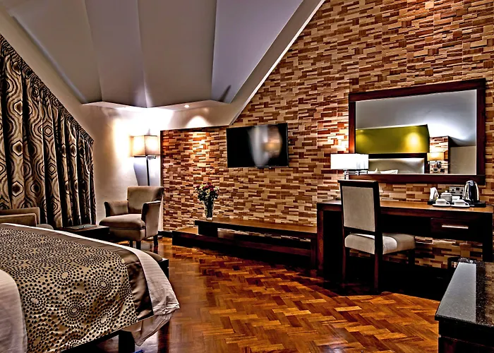 Magna Hotel And Suites